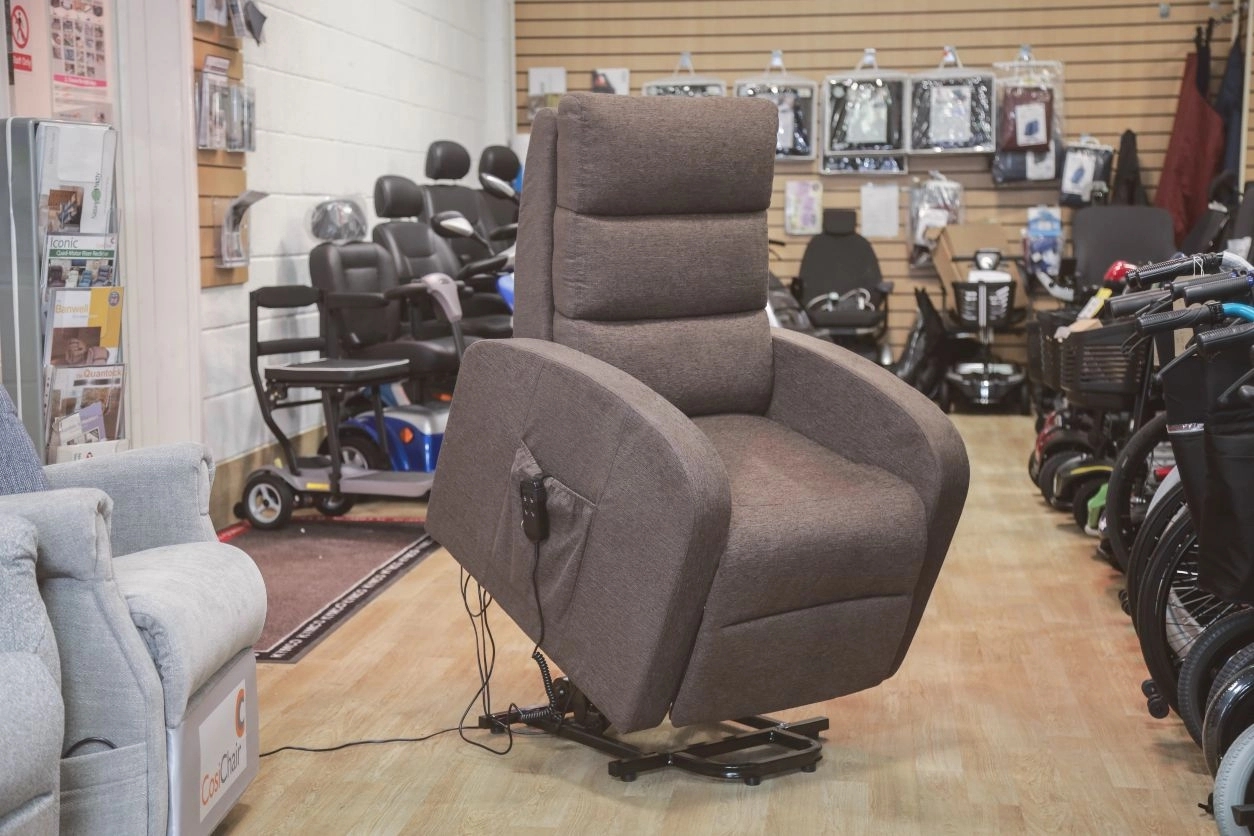 A mobility chair rising to show it helps users out of the chair